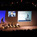 Large stage with seated discussion panel