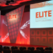 Elite investment summit stage with decorative lighting